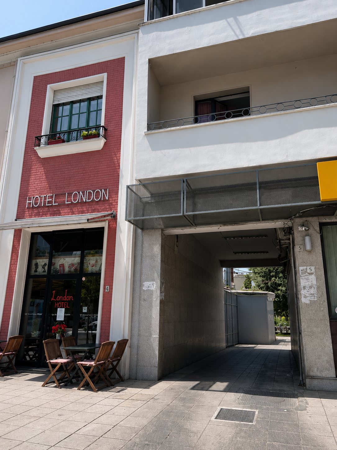 Hotel London on Bulevardi Zogu i Pare with the tunnel entrance immediately to its right